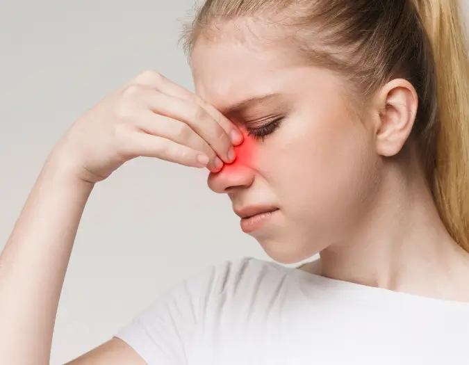 Patient with nasal congestion and runny nose due to allergic rhinitis receiving care at Dr. L Square Multispecialty Homeopathy Clinic