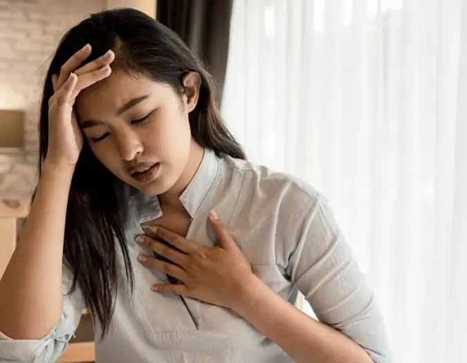 Person experiencing shortness of breath and airway constriction assessed by doctors at Dr. L Square Multispecialty Homeopathy Clinic