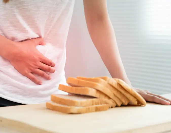 Doctor reviewing wheat allergy symptoms and gluten-related digestive sensitivity at Dr. L Square Multispecialty Homeopathy Clinic